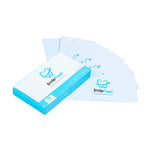 teeth whitening strips package and seven individual strips next to it